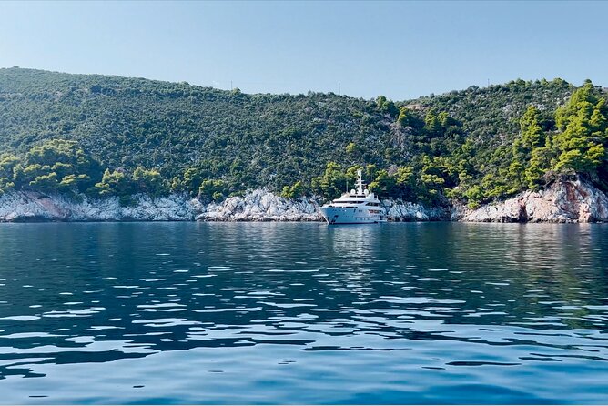 Island Hopping from Skiathos - Milia Beach: pine trees, hot sand, and swimming time