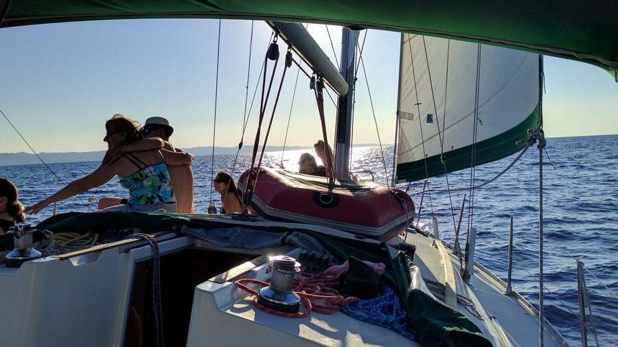 Kassandra: Sunset Sailing Boat Tour of Secluded Coves - Sunset from the deck