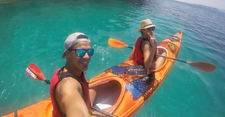 Lefkada: Hidden Blue Cave Kayak Trip with Lunch & Fruits - Paddling southeast from Mikros Gialos