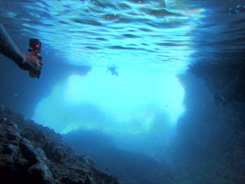 Lefkada: Hidden Blue Cave Kayak Trip with Lunch & Fruits - Entering the glowing Blue Cave