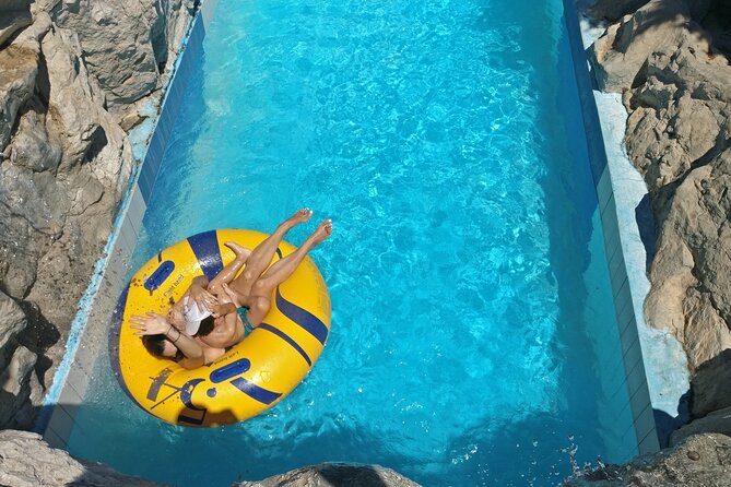 Lido Water Park Admission Ticket with Transfers - Food, lockers, shade, and the small costs