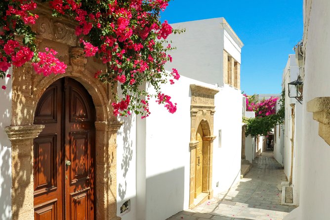 Lindos Day Cruise from Rhodes Town with Swimming stops and Hotel Transfers - The Acropolis walk needs honest planning