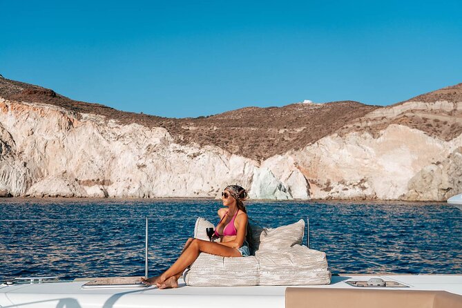 Luxury Santorini Sunset Cruise: Dinner, BBQ, Open Bar, Transfers - Mesa Pigadia Beach: Your First Swim Stop