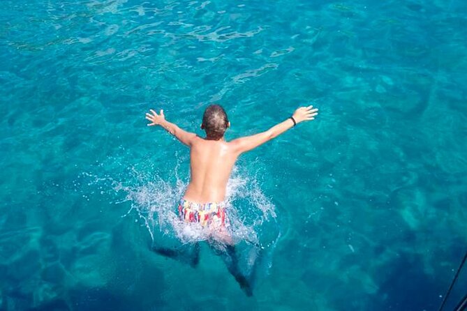 Mykonos 6hrs sailing cruise: Delos Rhenia with lunch & transfer - Rhenia: the swimming stop