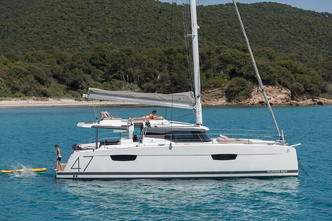 Mykonos: Brand-New Catamaran Cruise with Meal, Drinks & Transport - Boarding at Agia Anna and handling the tender boat