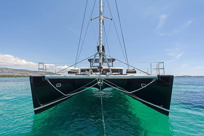 Mykonos Catamaran Premium Day-Sunset Tours 8-flavor Meal & Drinks - Leaving Ornos Bay for the open Aegean