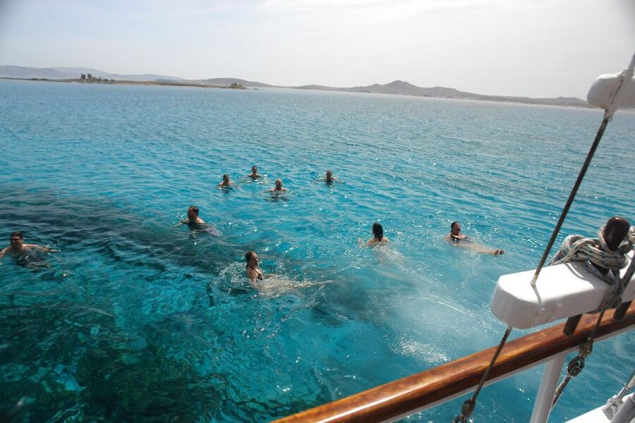 Mykonos: Sunset Party Boat Cruise with 1 Drink - The Agios Stefanos swimming stop