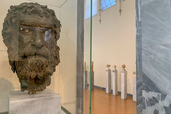 National Archaeological Museum Private Tour with Licensed Expert Guide - Inside the museum: the Charioteer and ancient bronze