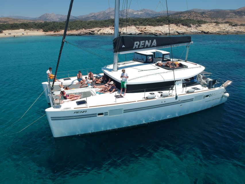 Naxos: Catamaran Cruise with Swim Stops, Food, and Drinks - Three swimming stops, snorkeling, and time to relax