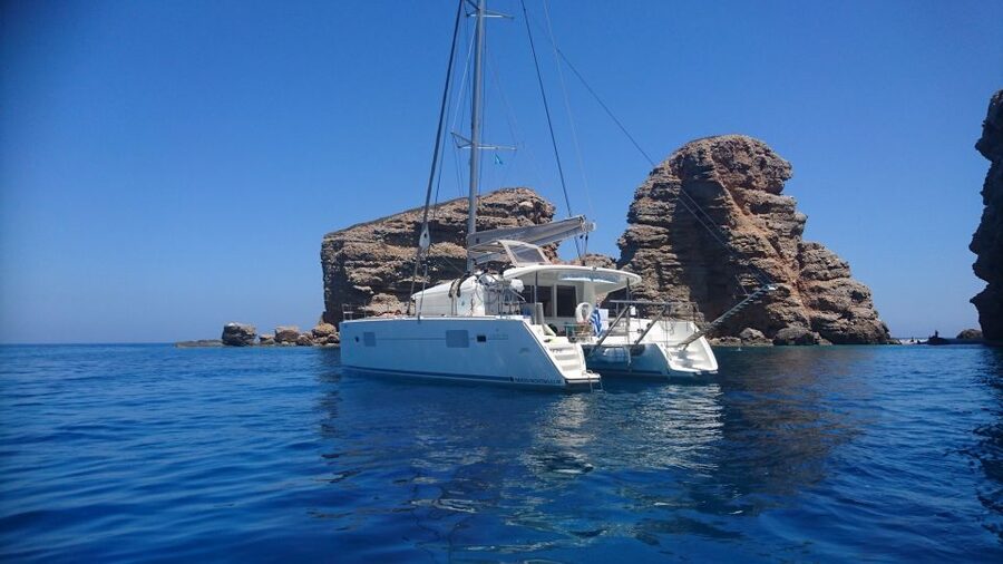 Naxos: Catamaran Cruise with Swim Stops, Food, and Drinks - Setting out from Naxos on a modern catamaran