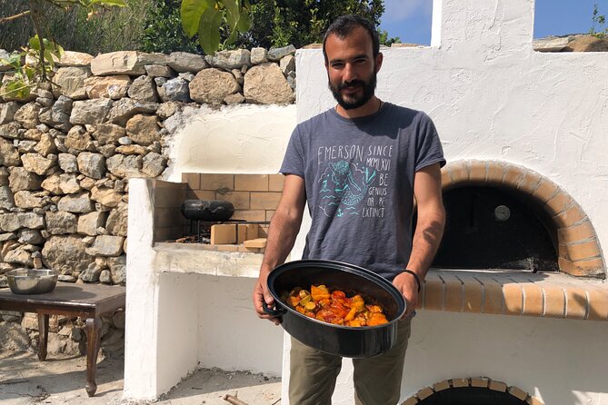 Naxos Perivoli Farm Experience & Wood-fire Cooking Class - Preparing a Naxian feast over wood fire