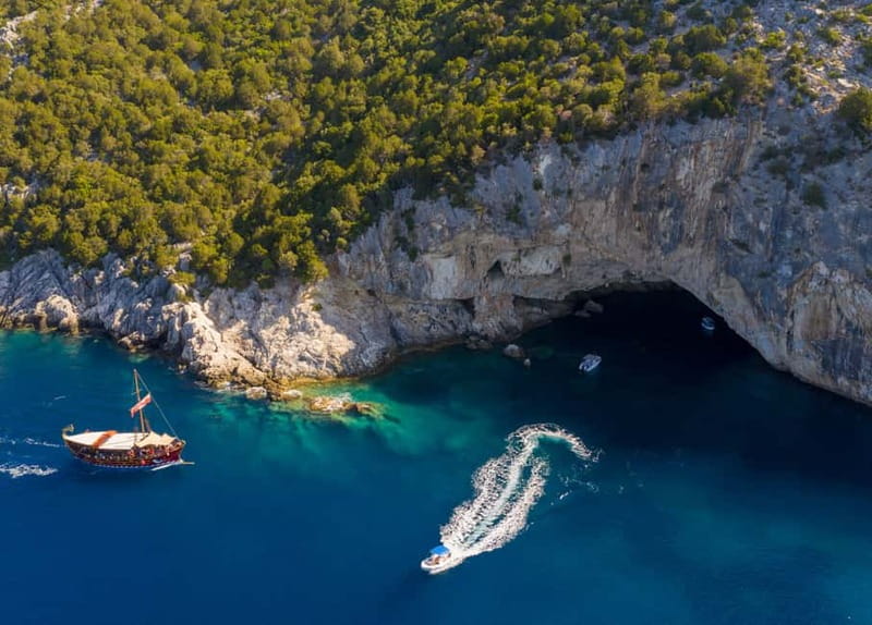 Nydri: Full-Day Wooden Boat Cruise with BBQ & Drinks - Klimaki Beach and the long barbecue lunch