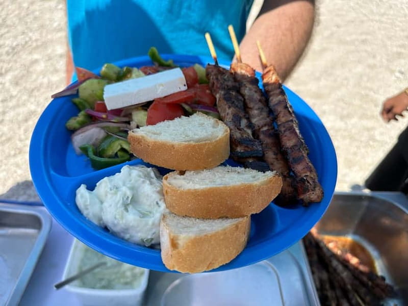 Nydri: Island Hopping Boat Cruise with Beach BBQ Lunch - Leaving Nydri for Papanikolis Cave