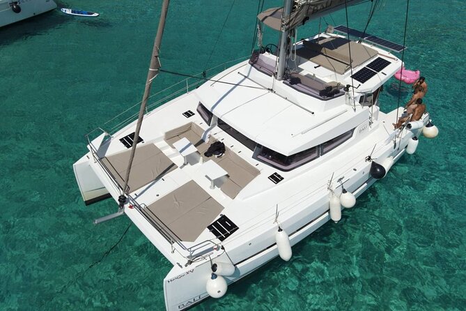 Panormo: Luxury Catamaran Cruise with Lunch & Open Bar - Weather, Cancellation, and Practical Details