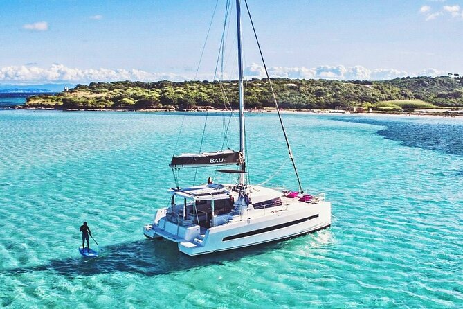 Panormo: Luxury Catamaran Cruise with Lunch & Open Bar - The Bay Stop: Swimming, Snorkeling, and SUP Boards