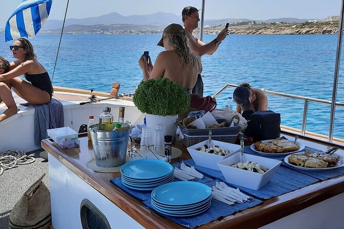 Paros Half Day Boat Tour from Naoussa port and Bay . - Captain Thanasi and the family feel