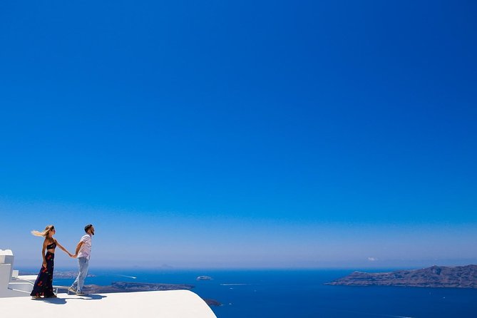 Personal Travel and Vacation Photographer Tour in Santorini - Posing help is a major part of the value