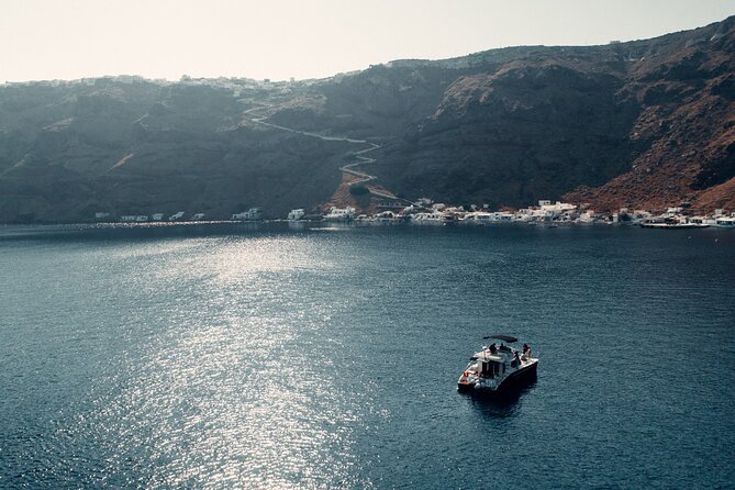 Private Caldera Cruise with Power Catamaran ENJOY incl. Meal & Drinks - White Beach for a longer swim