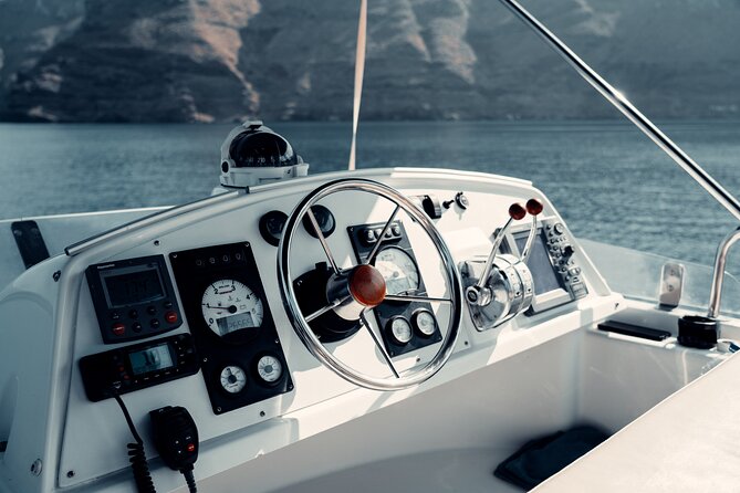 Private Caldera Cruise with Power Catamaran ENJOY incl. Meal & Drinks - Red Beach and the caldera’s volcanic colors