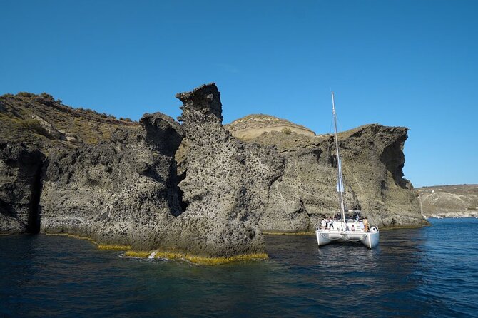 Private Luxury Santorini Catamaran Cruise with Port Pickup - Daytime sailing or a Santorini sunset