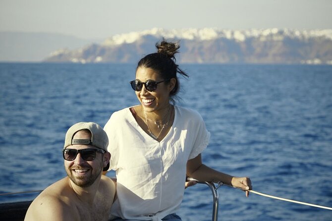 Private Luxury Santorini Catamaran Cruise with Port Pickup - Pickup from hotels, the airport, and cruise ships