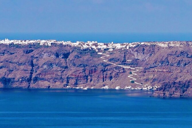 Private Motor Yacht Cruise with BBQ, Open Bar & Transfers - Why seeing Santorini by yacht changes the day