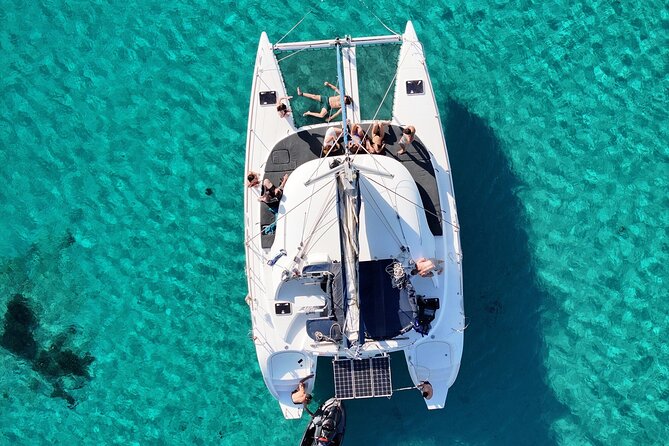Private Mykonos Catamaran Day Cruise with Meals & Water Toys - A chef-prepared meal with the sea as your dining room