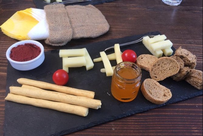 Private Santorini Cooking Class & Wine Tasting Tour - Anhydrous Winery turns the tasting into lunch
