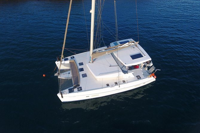 Private Sunset Cruise with Full Greek Dinner - Fira, Firostefani, Imerovigli, and Oia from below