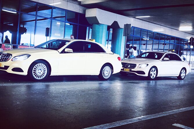 Private transfer from Athens International Airport to ATHENS CITY - Meeting your driver at Athens International Airport
