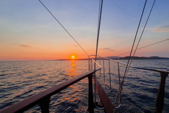 Queen Bee Sunset Cruise with Swim Stops and Dinner - Boarding at Argostoli for a family-run evening
