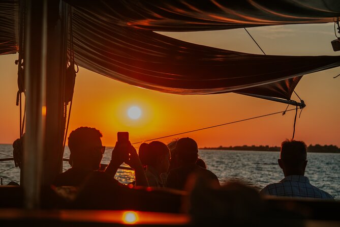 Queen Bee Sunset Cruise with Swim Stops and Dinner - Sailing toward Vardiani and the nearby beaches