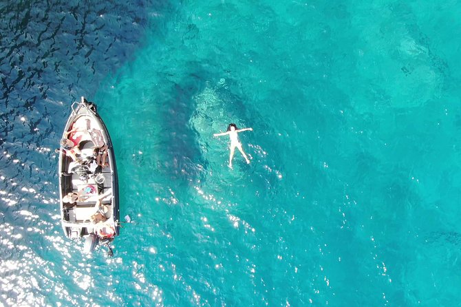Rent a Boat in Santorini without a License - Taking the helm from Vlichada
