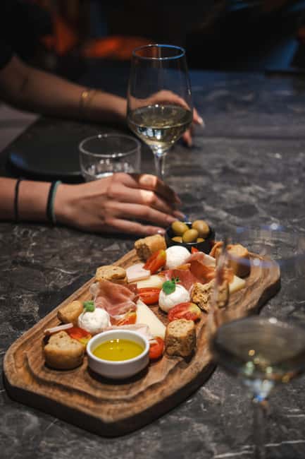 Rethymno: Cretan Wine Tasting Guided Tour with Local Food - What Antigone adds to the tasting