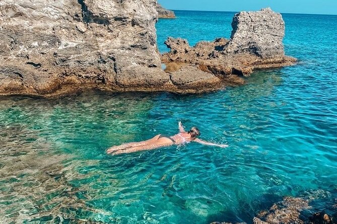 Rhodes Bay to Bay Swim Cruise-Greek Buffet w/wine included - Afandou Beach, open water, and a long swimming break