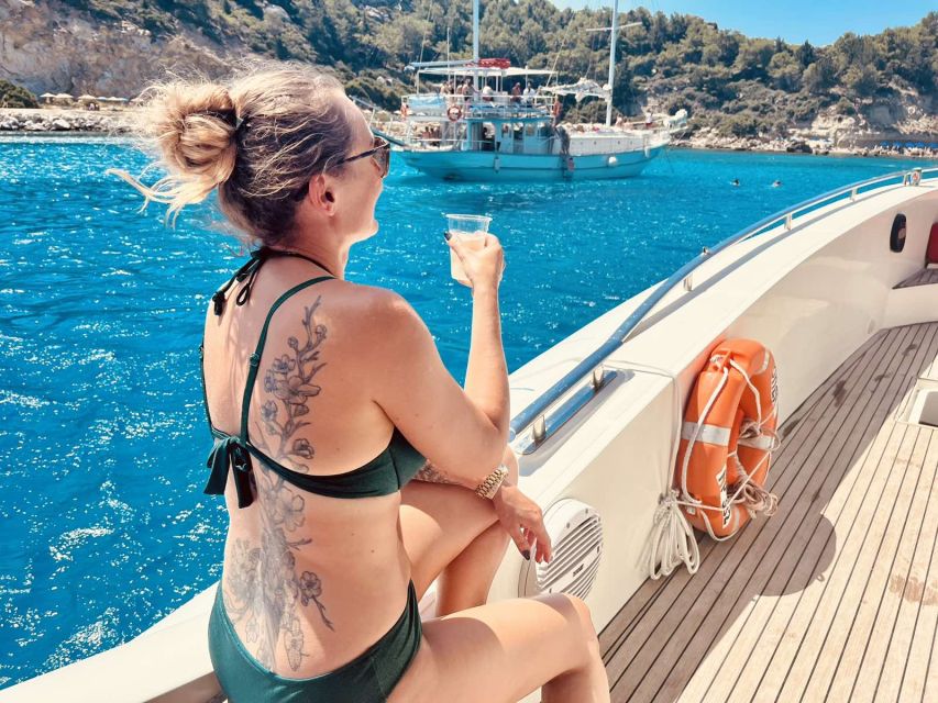 Rhodes: Beach Cruise with Swimming, Meal, & Unlimited Drinks - The Opera Boat from Mandraki Marina