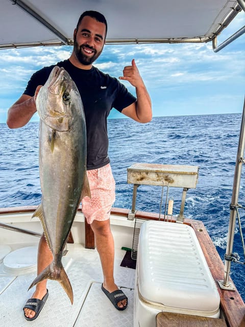 Rhodes: Captain Manolis Fishing Trip with BBQ and Swimming - Views of Rhodes from the sea