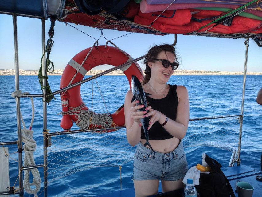 Rhodes: Fishing Trip, Snorkelling, BBQ, & Professional Guide - Swimming and snorkelling in a quiet bay