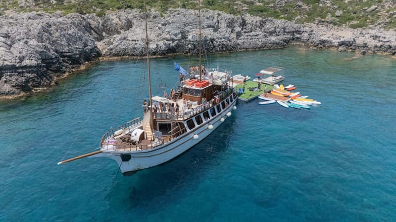 Rhodes: Gulet Trip with Food, Drinks, SUP, Kayak & Swimming - Two hours at Fun Island in Ladiko Bay