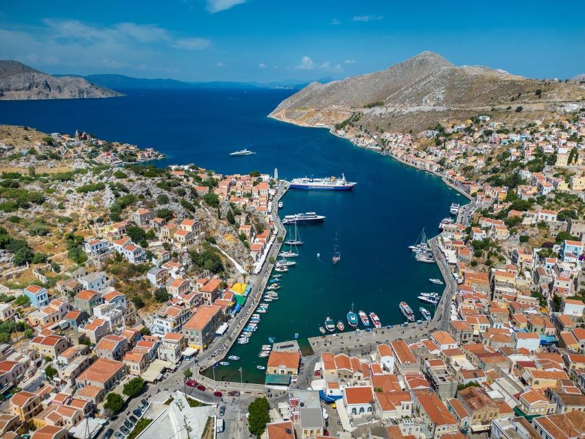 Rhodes: High-Speed Boat to Symi Island and St George's Bay - Arriving at Symi’s colorful harbor