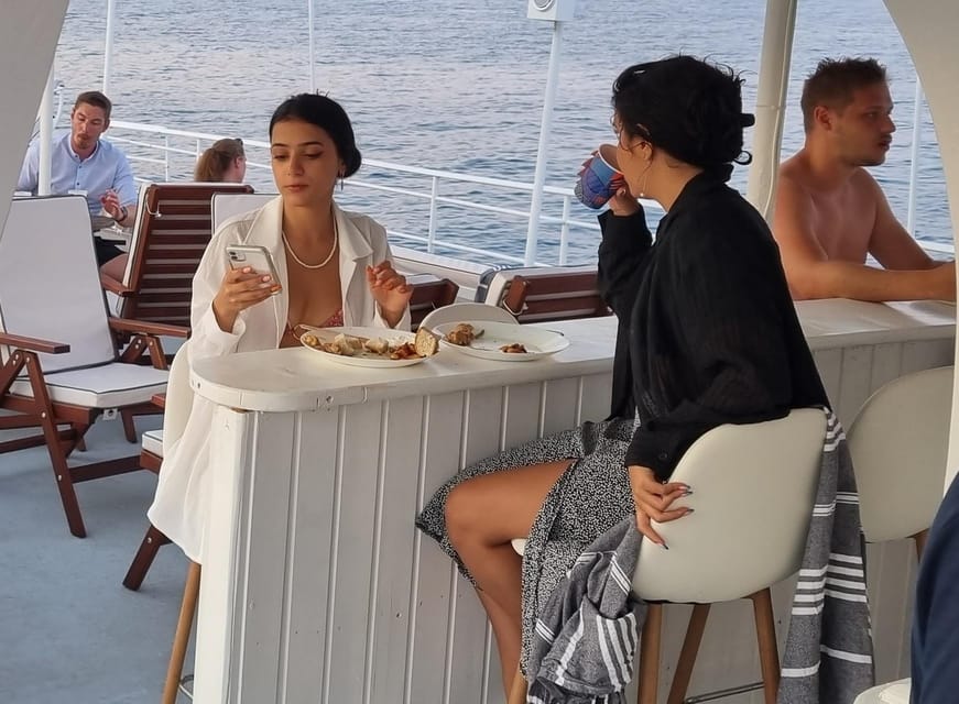 Rhodes: Sunset Cruise with Live Music, Wine & Greek Buffet - Kallithea Bay gives you the evening’s active moment