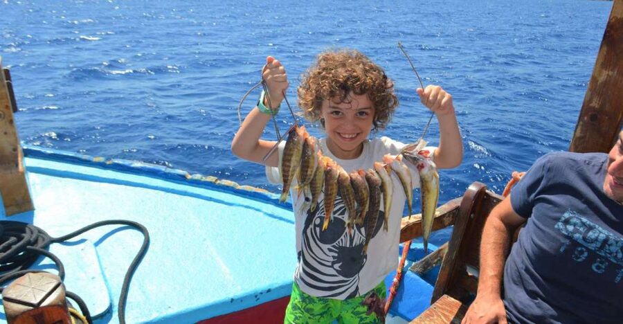 Rhodes Town: Fishing Boat Trip with Fish Meal and Swim Stops - Learning to fish without needing experience