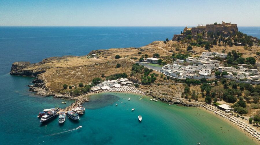 Rhodes Town: Scenic Cruise to Lindos with Swim Stops - Mandraki views before the open coast