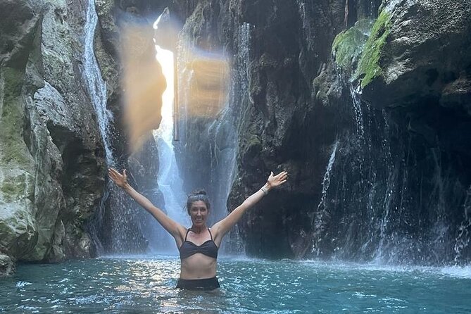 River Trekking at Kourtaliotiko Gorge Waterfalls to Preveli Beach - Swimming beneath the waterfall