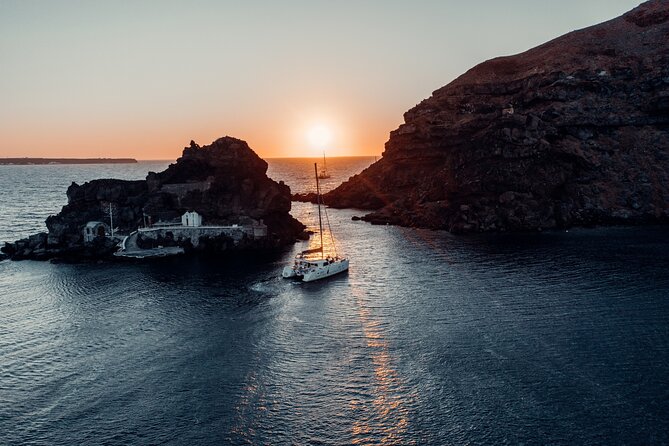 Romantic Sunset Catamaran Caldera Cruise incl. Meal & Drinks - Boarding, transfers, and the first hour