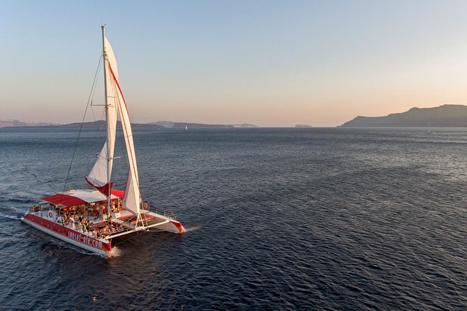 Sailing Catamaran Cruise in Santorini with BBQ, Drinks and Transfer - Starting from Ammoudi or Athinios Port