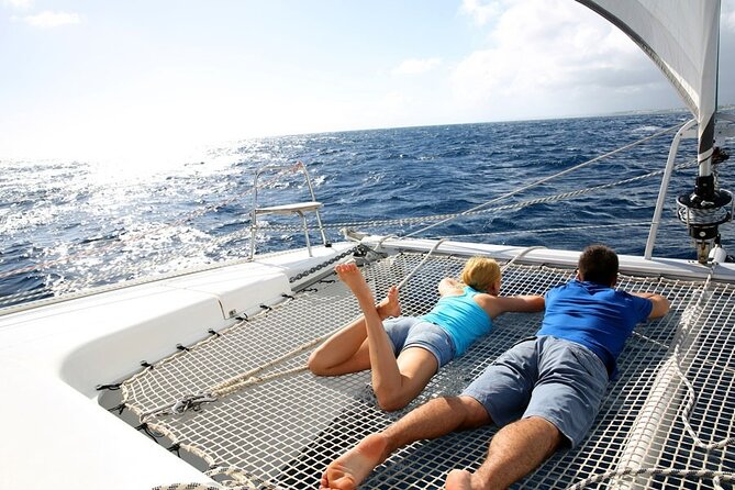 Santorini: Caldera Classic Semi-Private Cruise with BBQ & Drinks - Red Beach and the changing colors of the coast