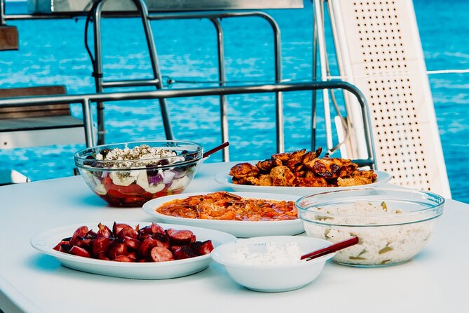 Santorini Caldera Gold Day Cruise with BBQ on board and Open Bar - Thirassia, lunch, and the open bar