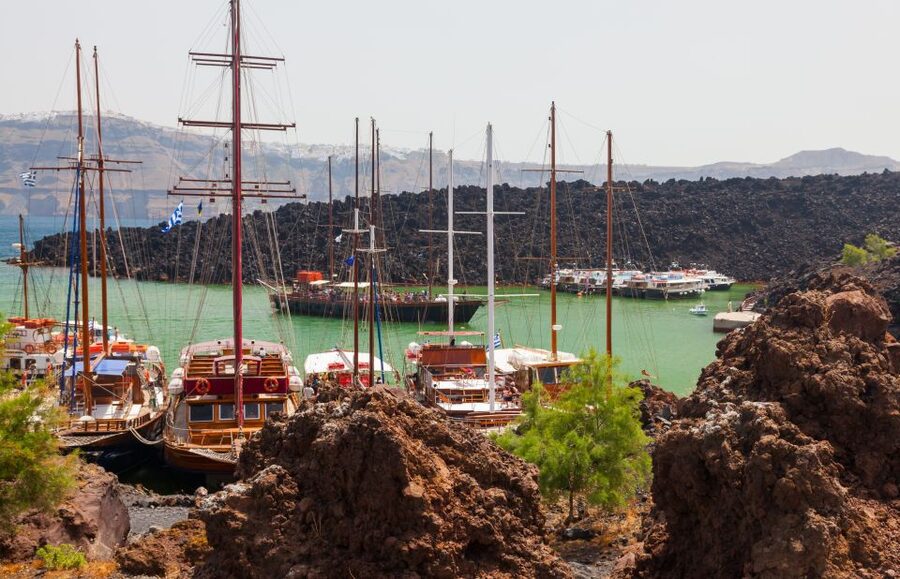 Santorini Caldera: Sunset Cruise with Dinner - Watching the sunset in Oia