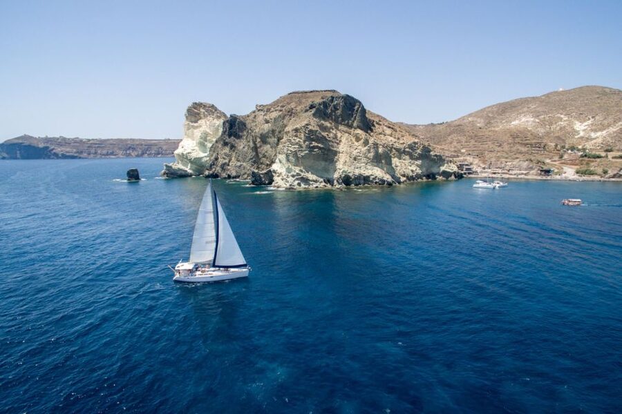 Santorini Caldera: Sunset Sailing Cruise with Meal - Leaving Vlychada and reaching Red Beach